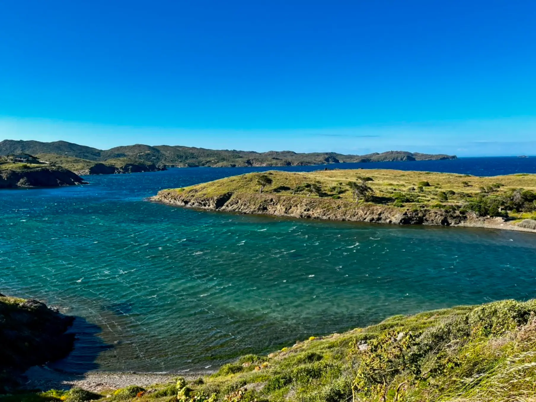 Turquoise bay and rugged coastline near Platja des Calders, Cadaqués